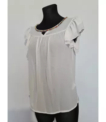 Blouse with a frill on the sleeves and decorative ecru sequins