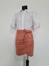 Short pink suede skirt