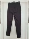 Trousers 3/4 length fastened with a decorative zipper - Black