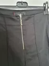Trousers 3/4 length fastened with a decorative zipper - Black