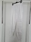 Trousers with an elastic waist and cuffs on the legs - White